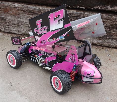 Custom works rc - In 1984, after 24 years in the specialty automotive industry, Jerry Landgraff started a serious interest in R/C racing. His son Brian (16 years old at the time) had been racing 1/10 scale off-road cars for several months when he decided oval racing might be fun.